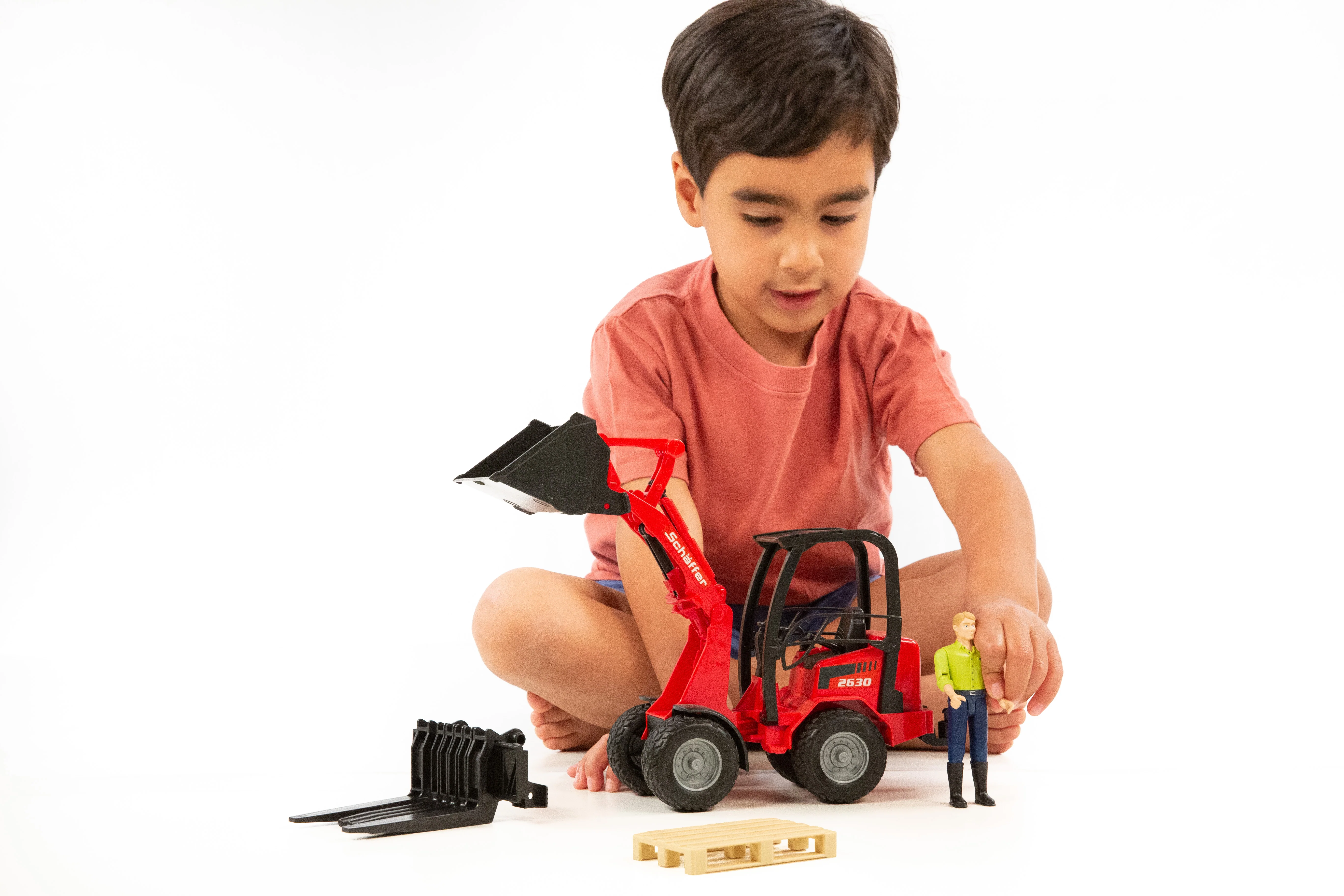 Bruder 02191 Schaeffer Compact Loader 2034 with Figure and Accessories 18.10.10 - Image 4
