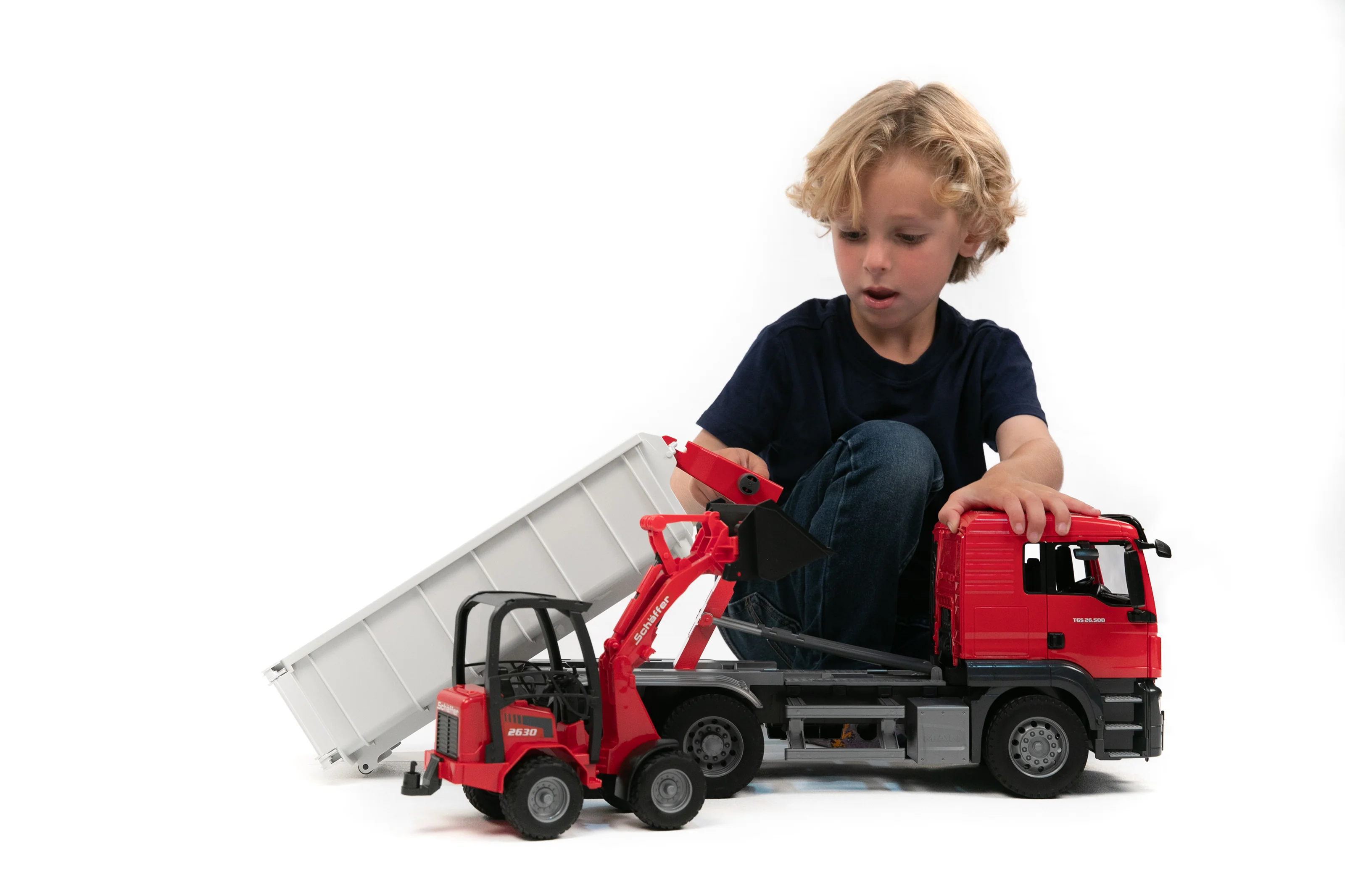 Bruder 03767 Man TGS Truck with Roll-Off Container and Schaffer Compact Loader 24.12.8 - Image 6