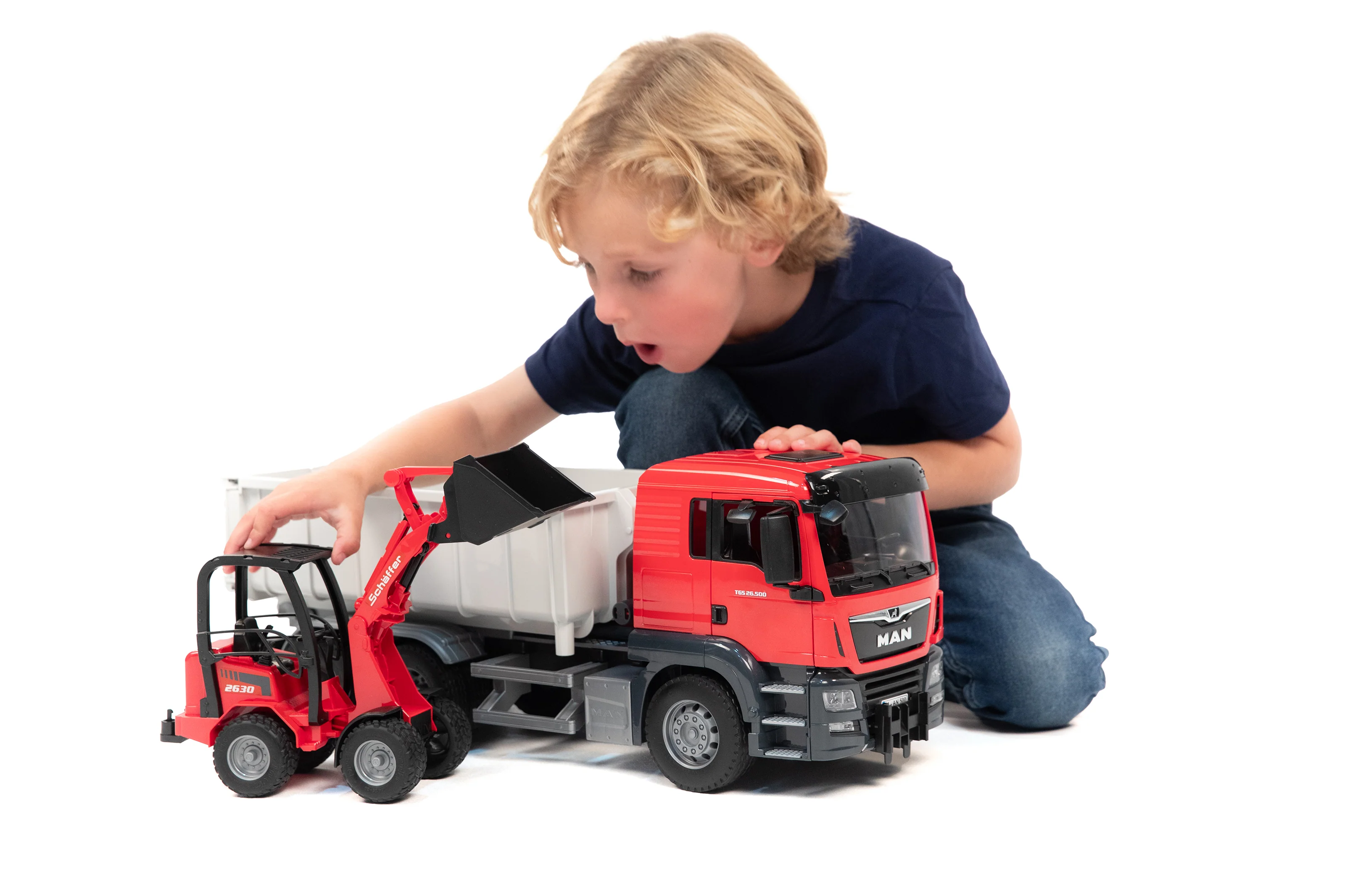 Bruder 03767 Man TGS Truck with Roll-Off Container and Schaffer Compact Loader 24.12.8 - Image 7
